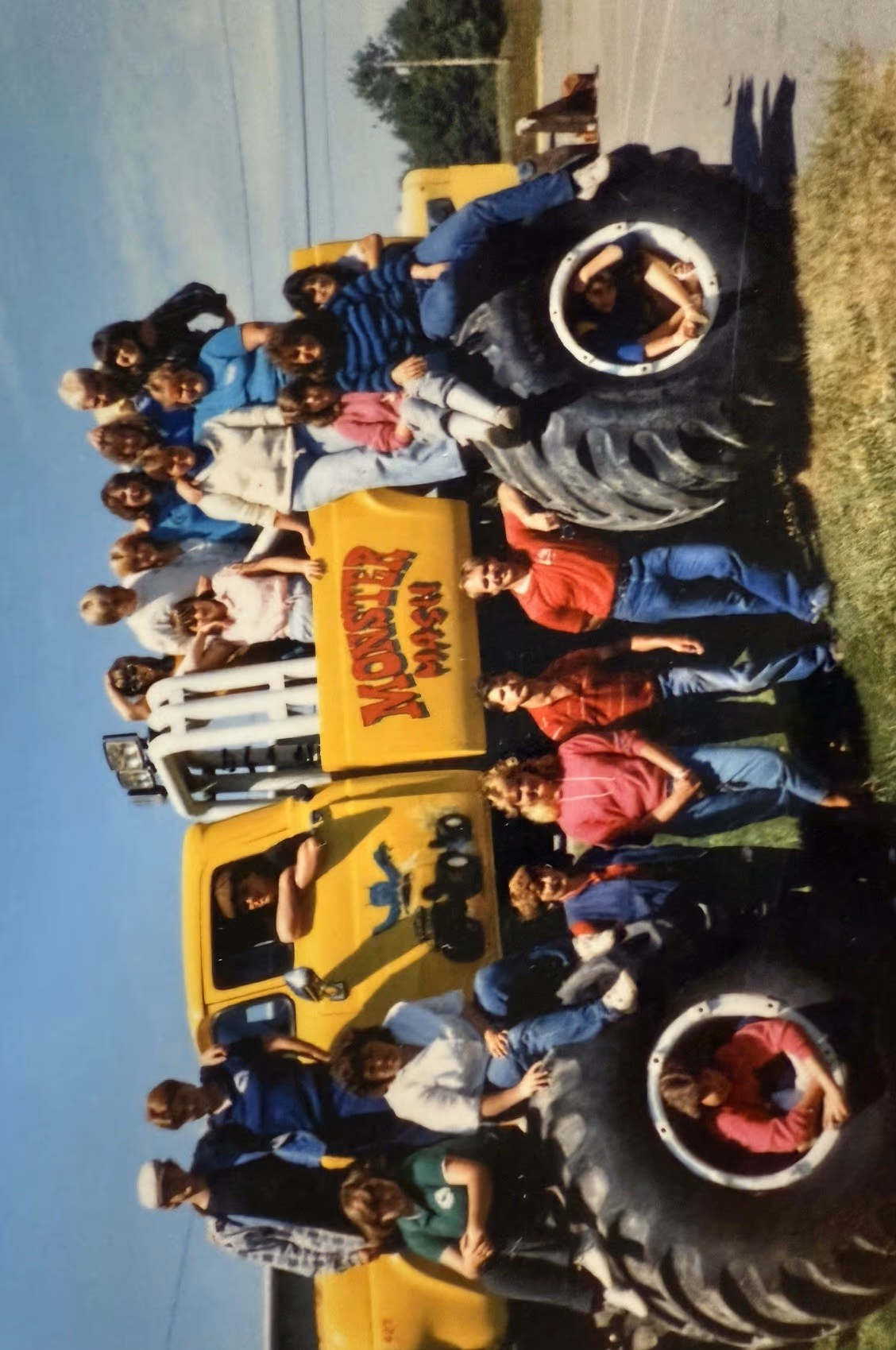 campers and staff on a monster truck