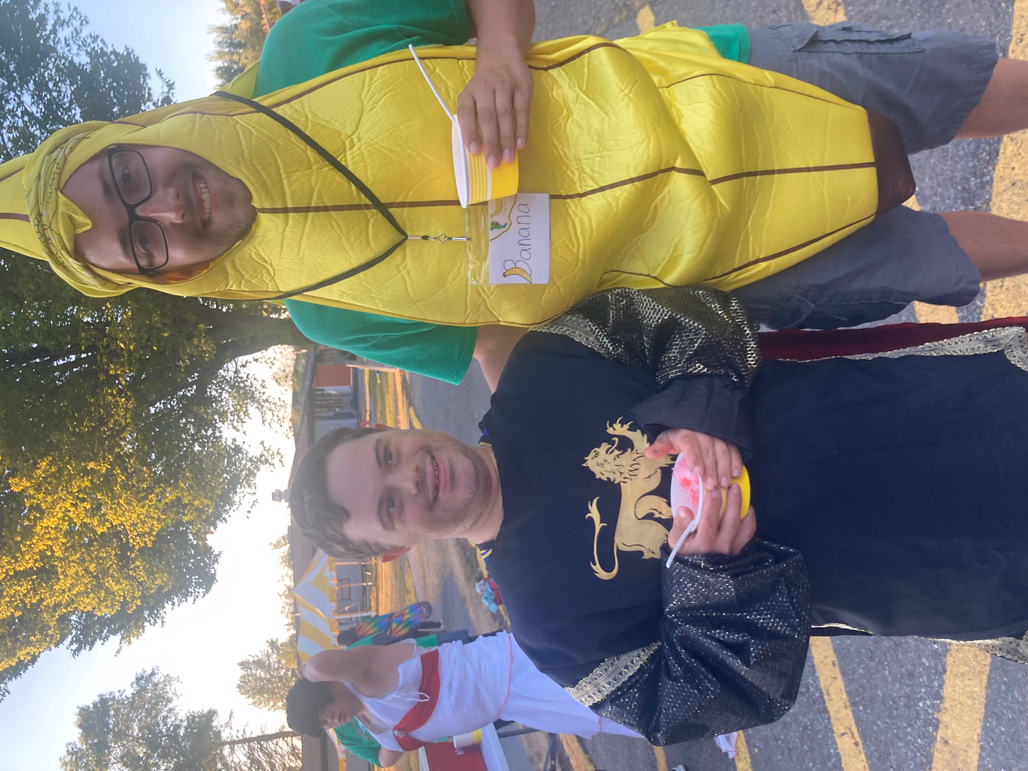 a camper and a staff member dressed up as a banana